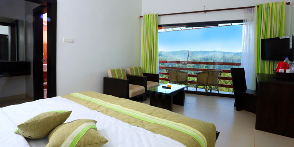 A room interior framing the Western Ghats