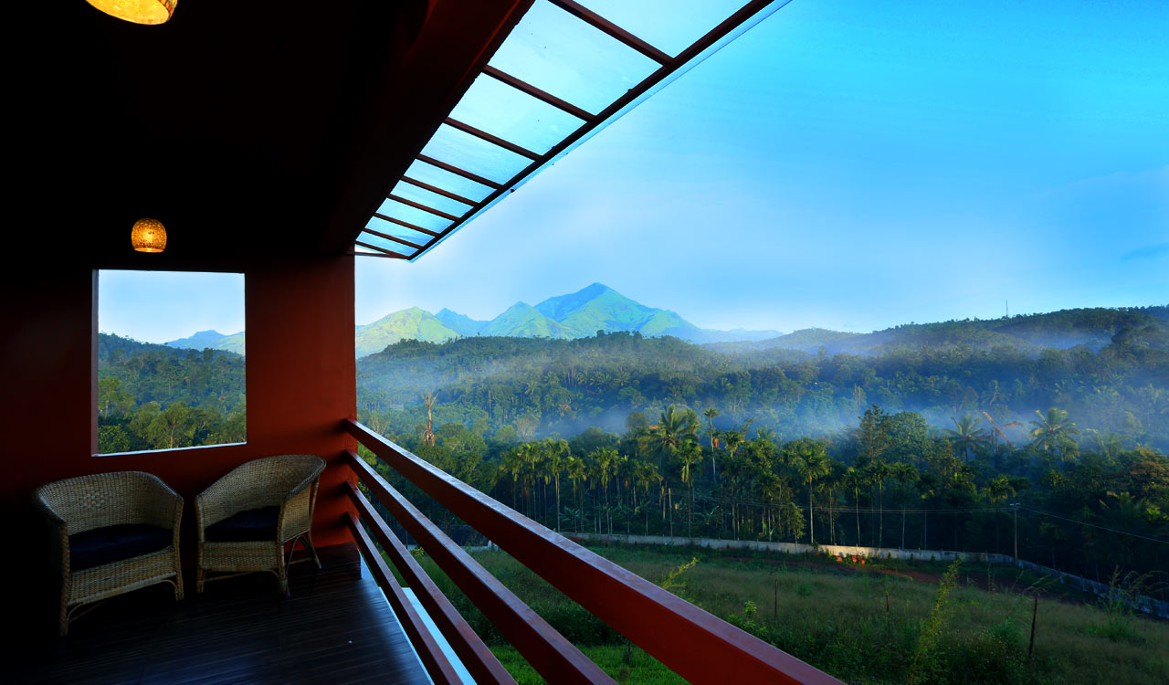 The property bathed in soft mountain light